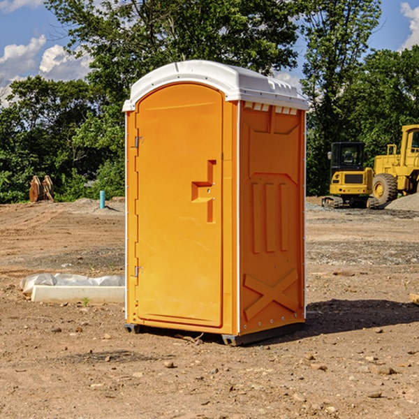 what is the cost difference between standard and deluxe portable toilet rentals in Moccasin